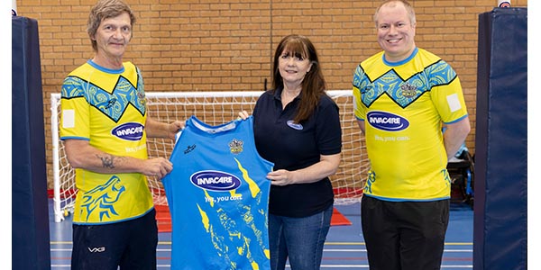 Aber Valley Wolves present shirt to Invacare