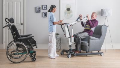 The Invacare ISA standard stand assist lifter, patient and carer transfer from/to comfort chair and wheelchair